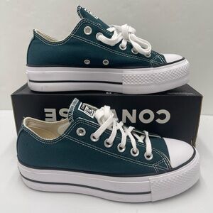 Converse Women's CTAS LIFT OX
DARKLY JADED/WHITE/BLACK Canvas Platform Sneakers